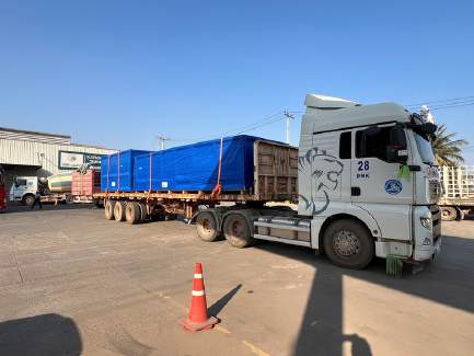 iSolution Logistics truck carrying blue cargo